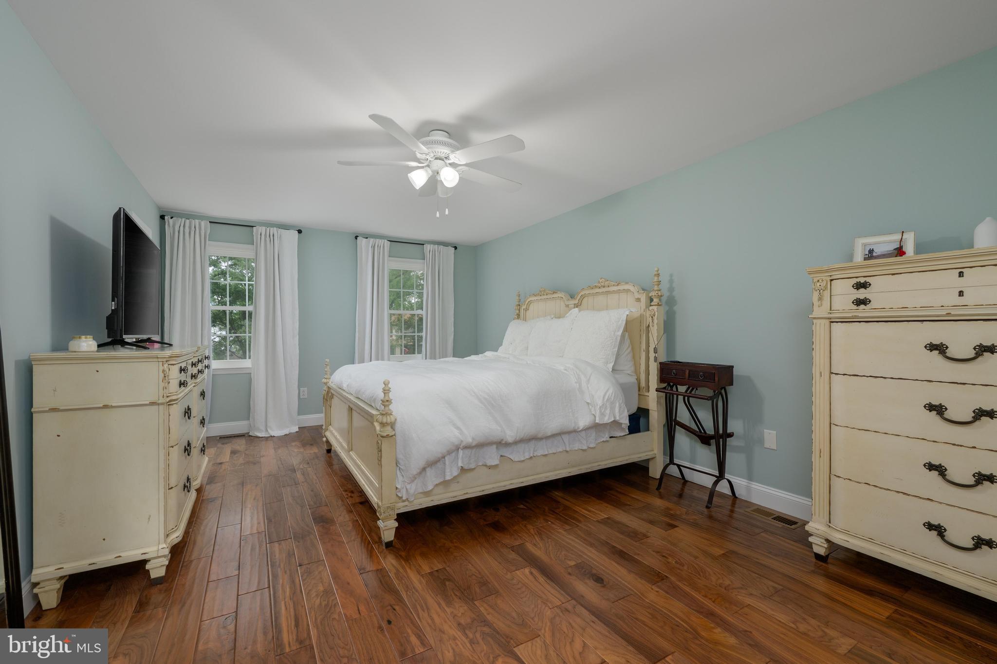 47 Millstone Drive Shamong, NJ 08088 - Photo 17 of 32 a bedroom with a bed and wooden floor