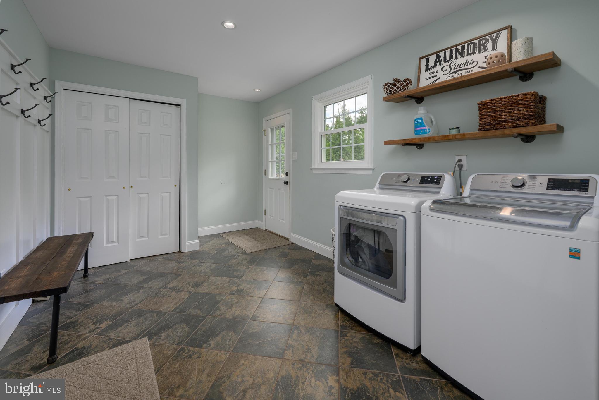 47 Millstone Drive Shamong, NJ 08088 - Photo 23 of 32 a utility room with sink dryer and washer