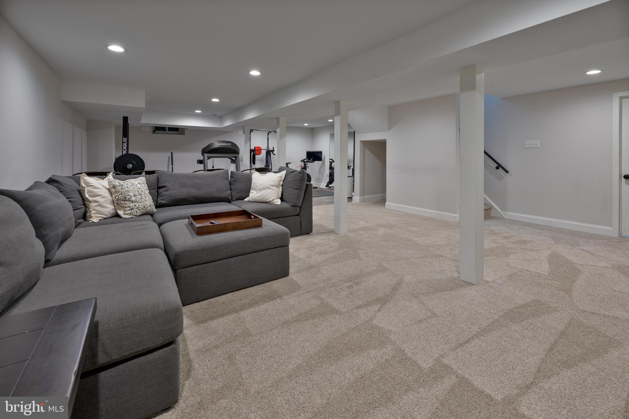 47 Millstone Drive Shamong, NJ 08088 - Photo 24 of 32 a living room with furniture and a glass door