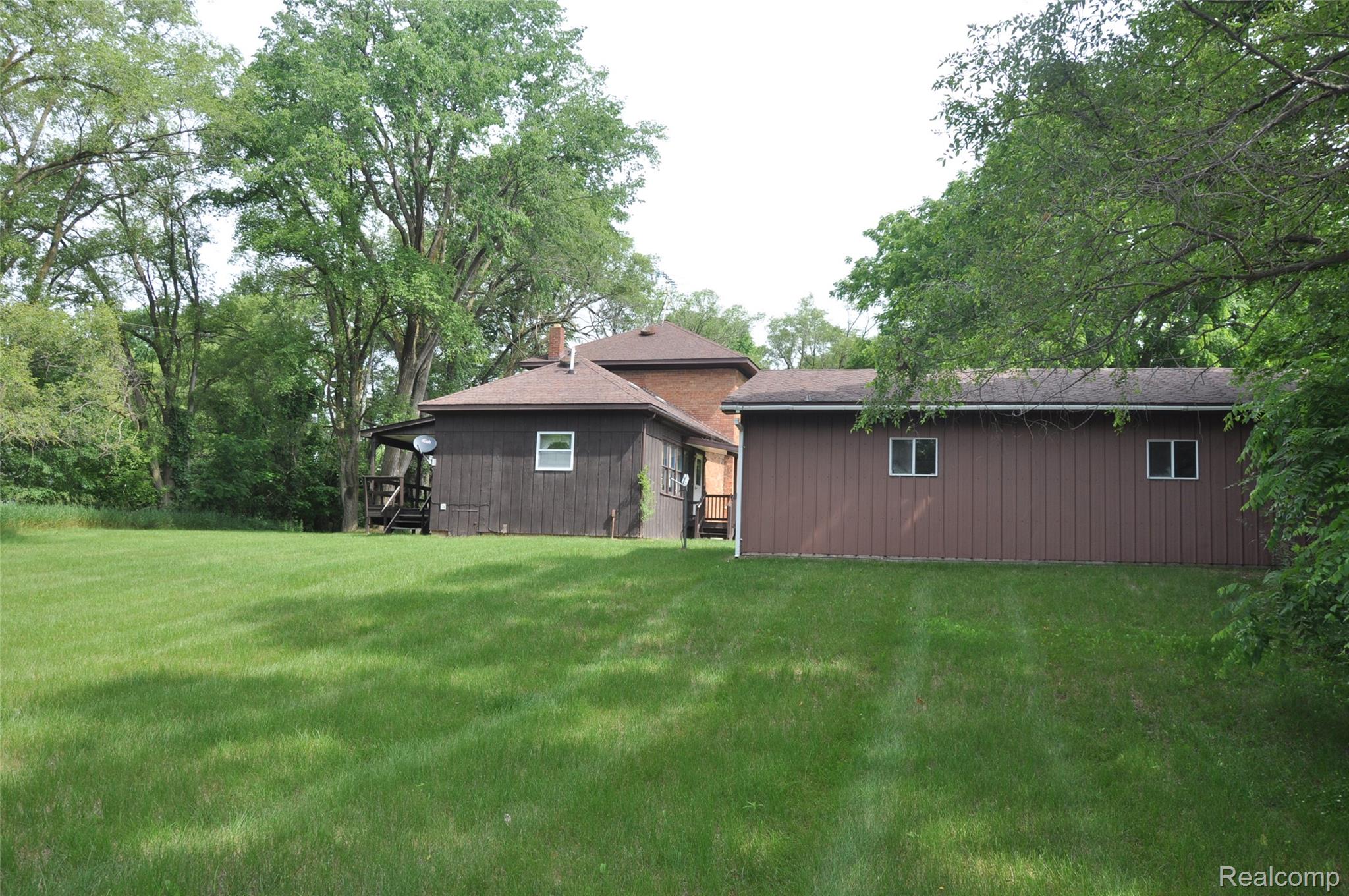 3954 Mayville Road Silverwood, MI 48760 - Photo 6 of 30 Expansive green lawn with mature trees bordering the property