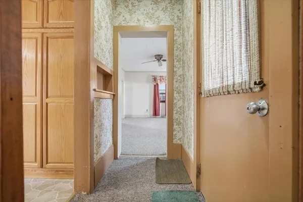 a view of a big room with a window