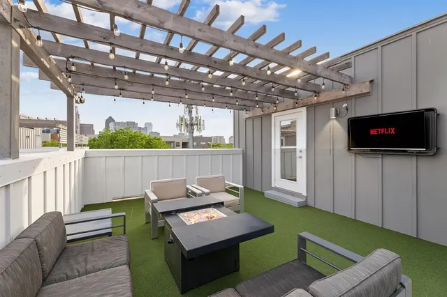 a table and chairs in a balcony