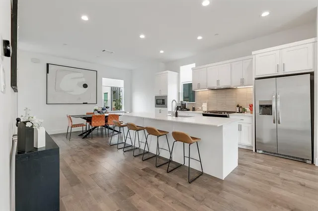 a kitchen with counter top space and refrigerator
