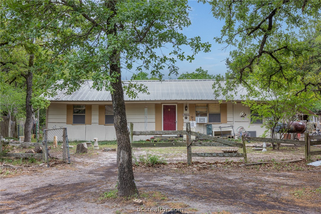 604 Hilton Road Bryan, TX 77807 - Photo 31 of 31 a front view of a house with garden