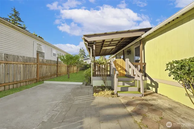 a view of a house with a park