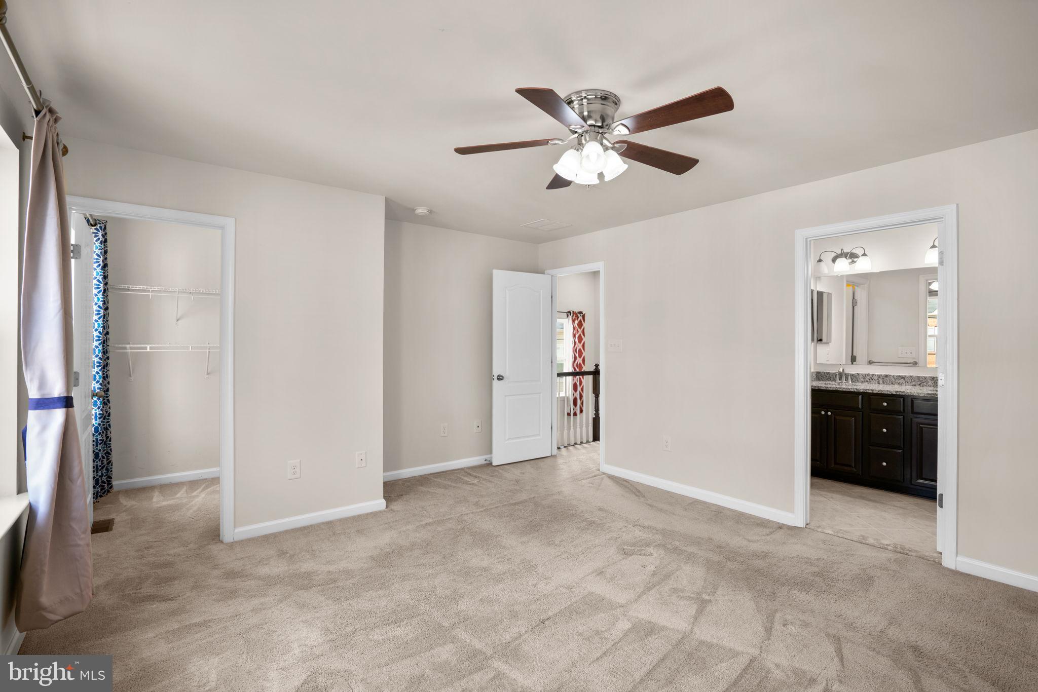 7977 Alchemy Way Elkridge, MD 21075 - Photo 14 of 33 a view of an empty room with closet and a bathroom