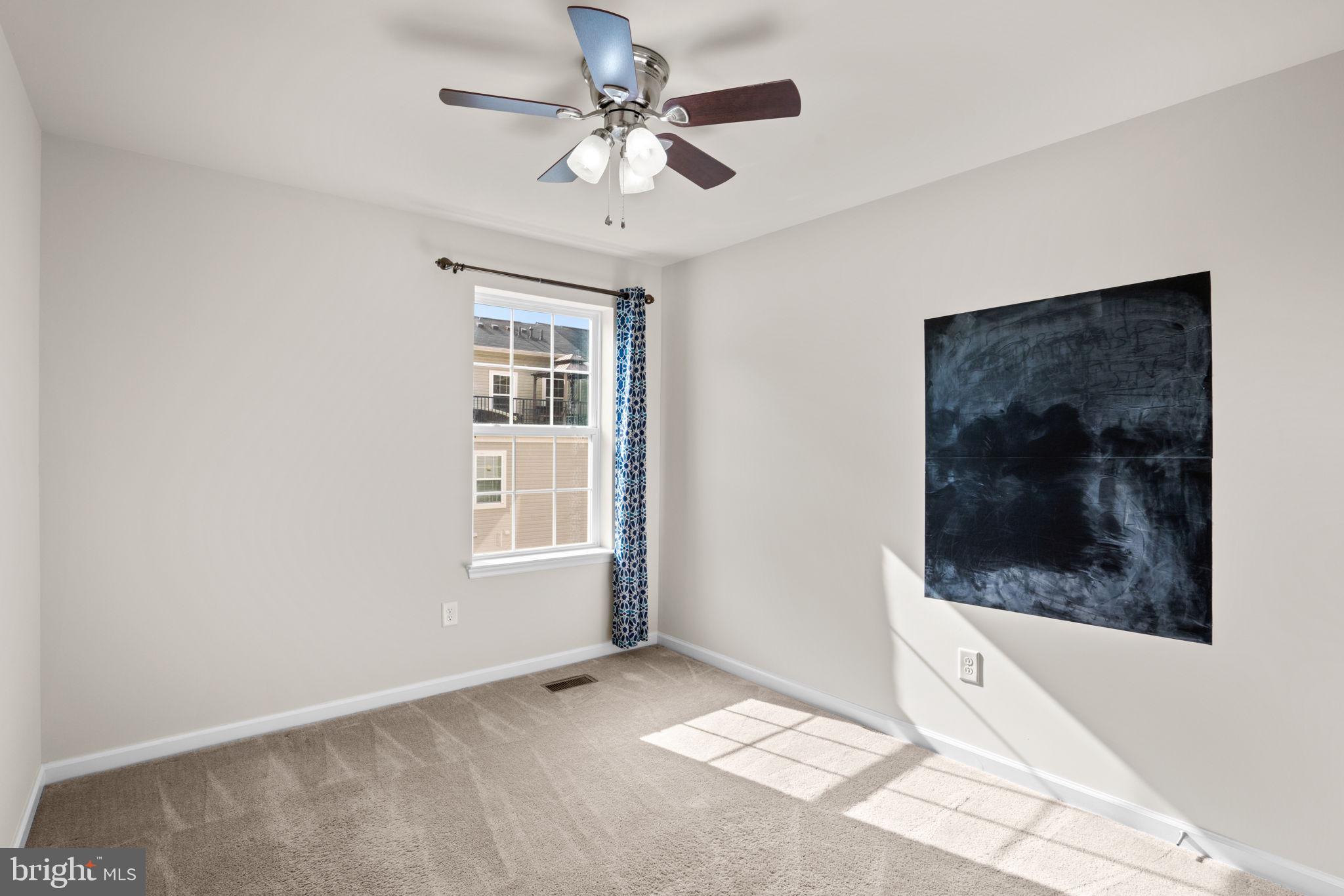 7977 Alchemy Way Elkridge, MD 21075 - Photo 19 of 33 a view of an empty room with a window