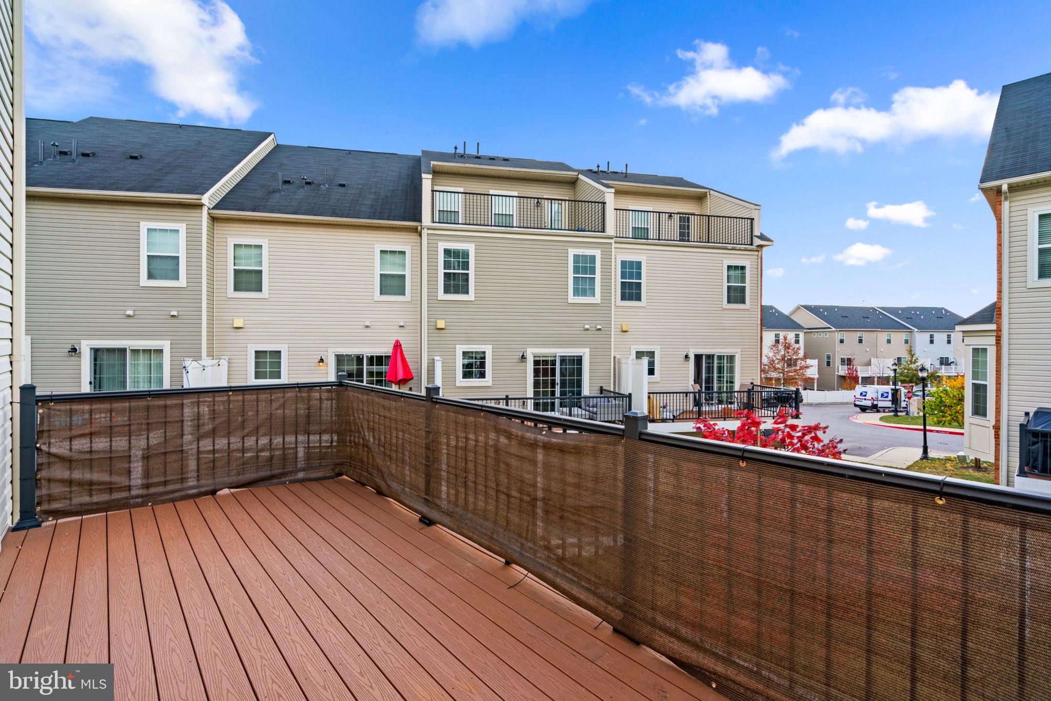 7977 Alchemy Way Elkridge, MD 21075 - Photo 28 of 33 a view of a house with roof deck