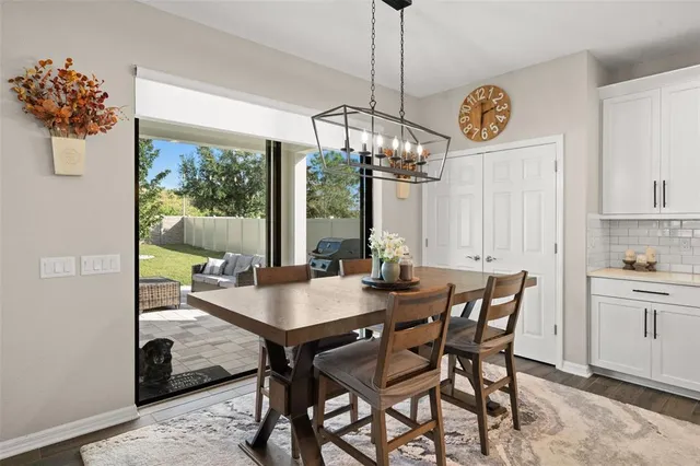a view of a dining room and a table or chairs