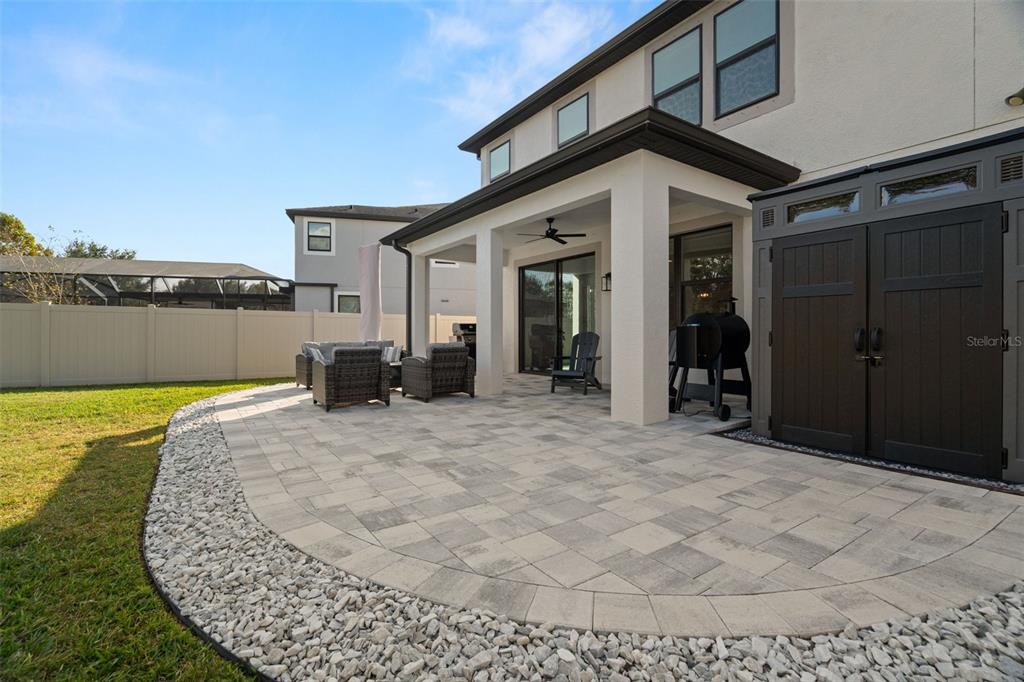 1216 Multiflora Loop Lutz, FL 33558 - Photo 17 of 50 a view of a house with swimming pool and porch