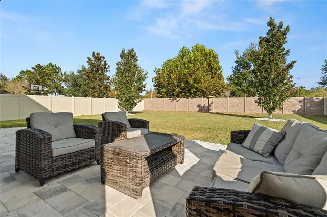 a outdoor living space with furniture and city view