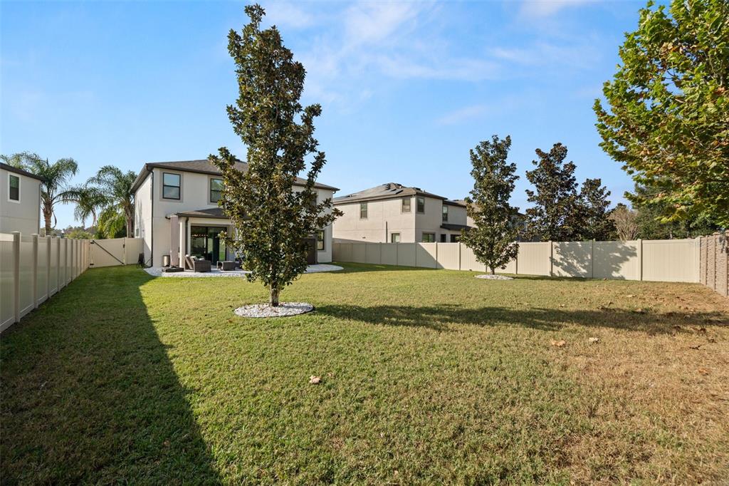 1216 Multiflora Loop Lutz, FL 33558 - Photo 40 of 50 a house view with garden space