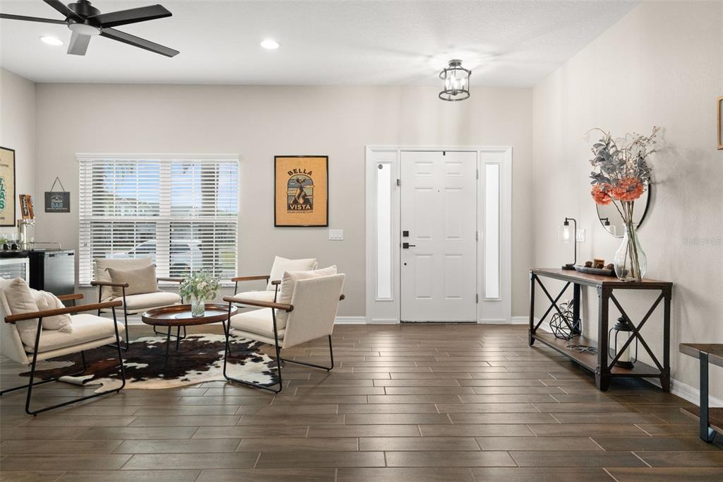 1216 Multiflora Loop Lutz, FL 33558 - Photo 4 of 50 a living room with furniture