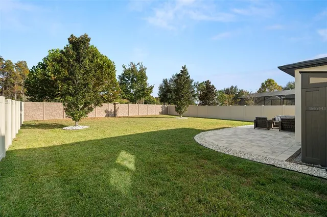 a view of outdoor space yard and swimming pool