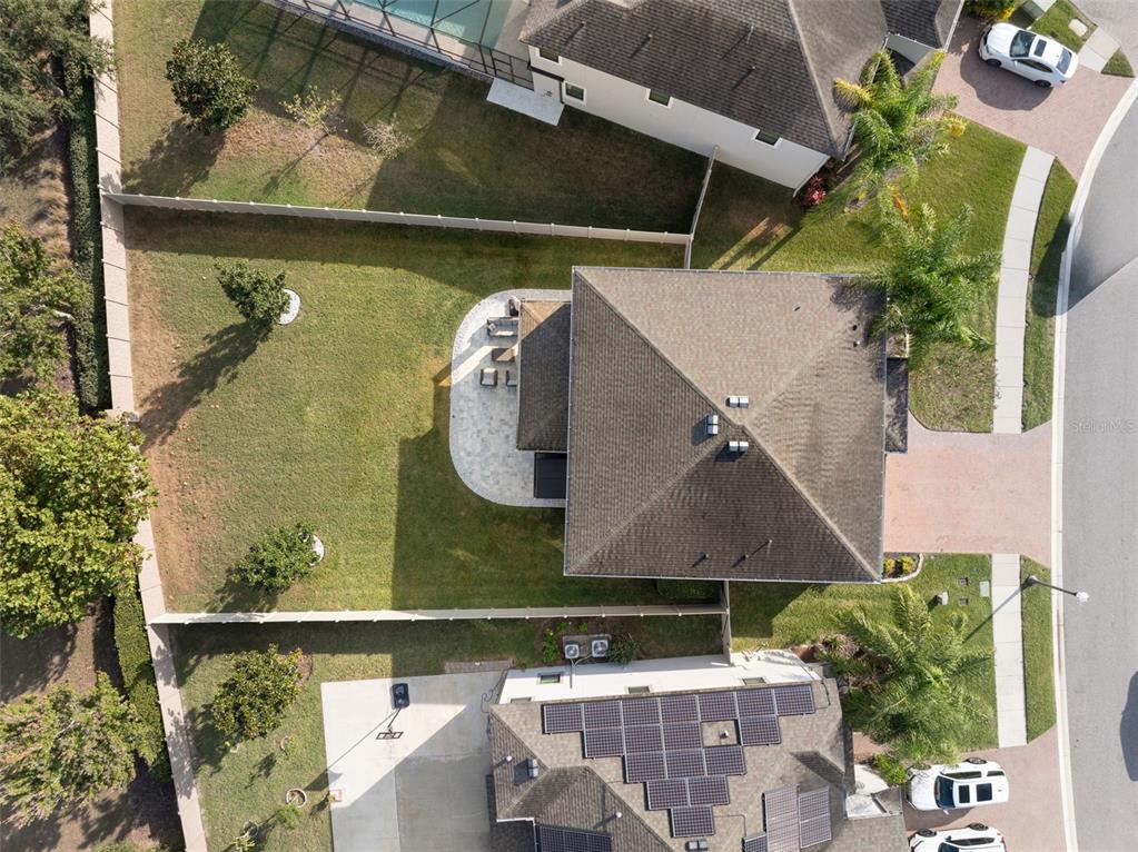 1216 Multiflora Loop Lutz, FL 33558 - Photo 47 of 50 an aerial view of a house with a lake view