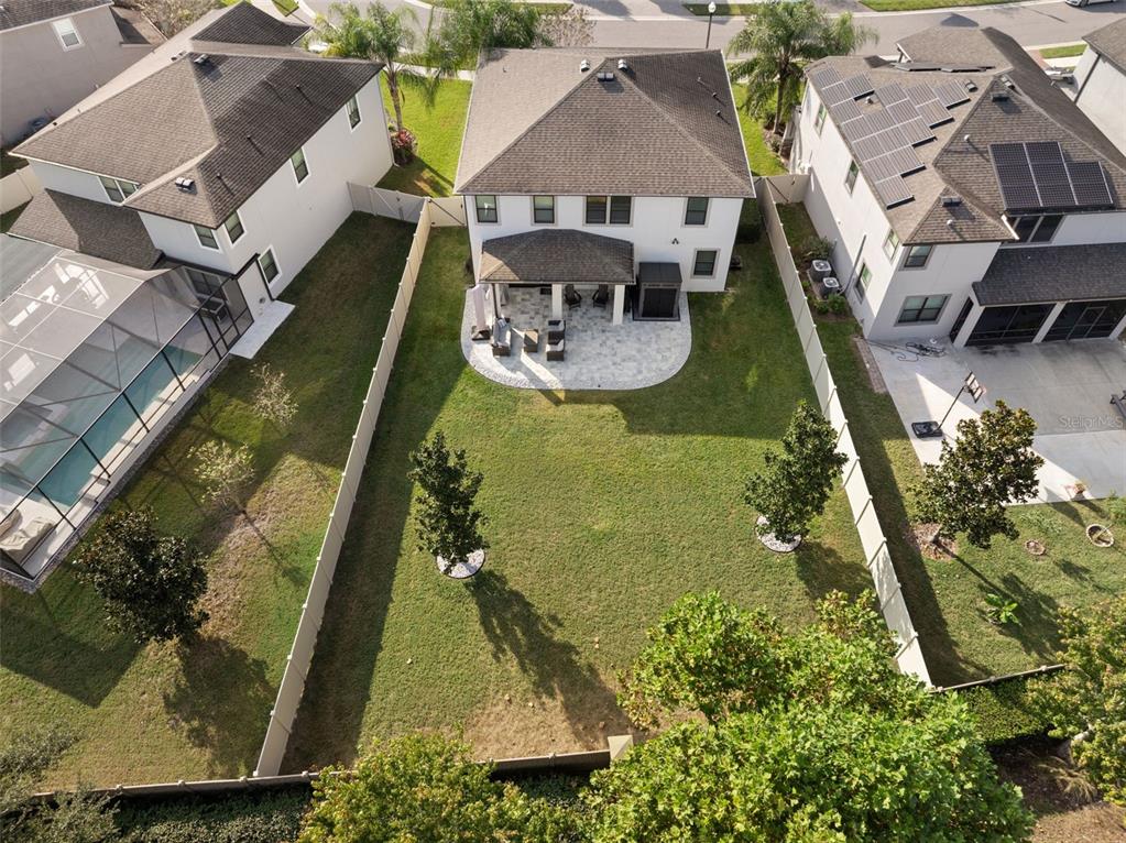 1216 Multiflora Loop Lutz, FL 33558 - Photo 48 of 50 an aerial view of a house with garden space ocean view