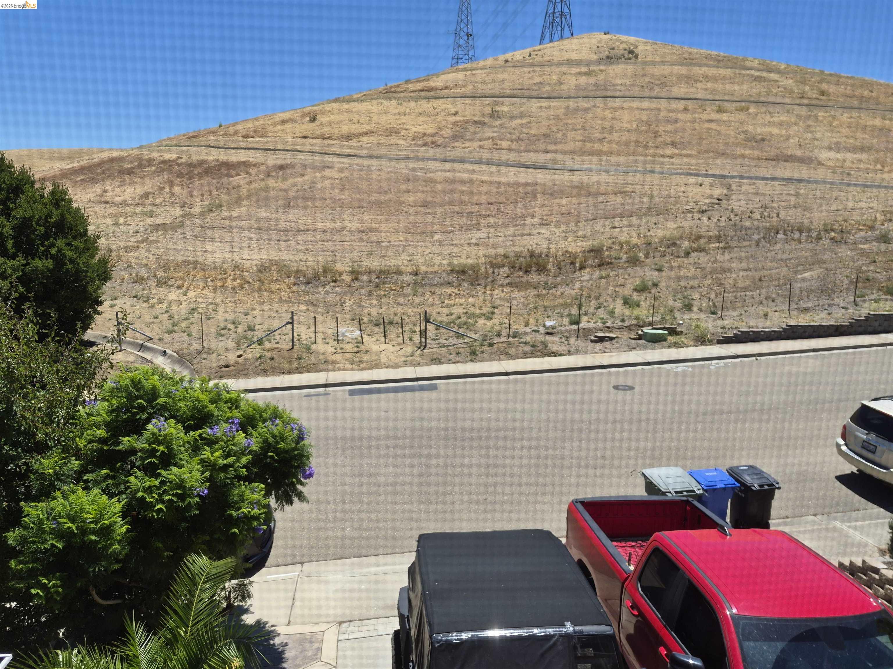 149 Oakpoint Court Bay Point, CA 94565 - Photo 16 of 22 Expansive hillside property featuring natural vegetation and a clear blue sky