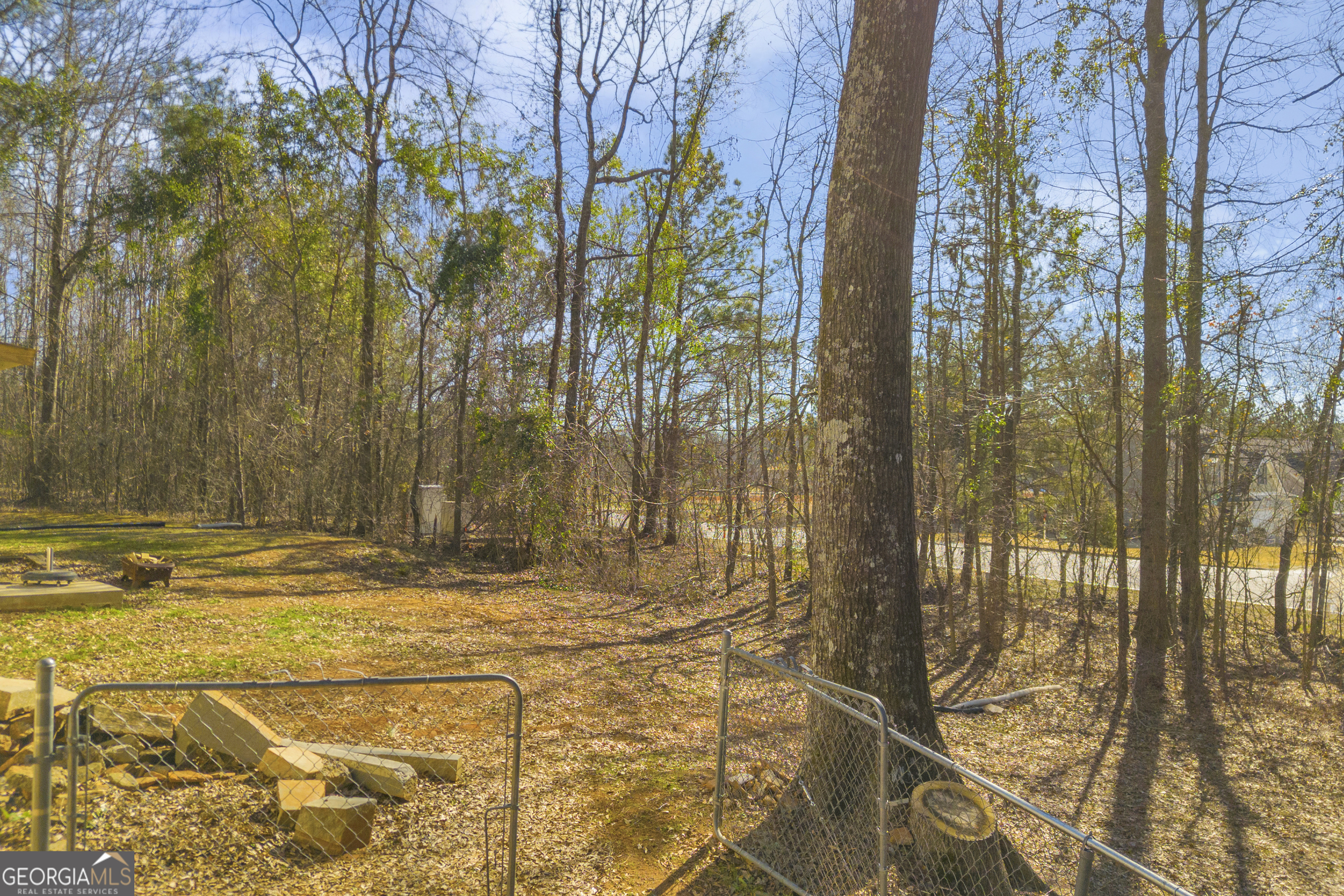 139 Silverstone Circle Jefferson, GA 30549 - Photo 26 of 85 a view of a backyard of the house