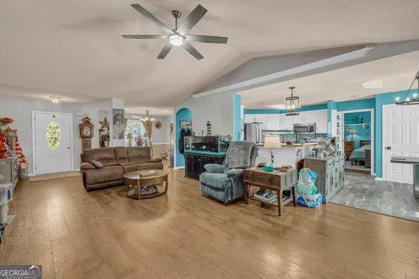 a bedroom with a bed and a walk in closet