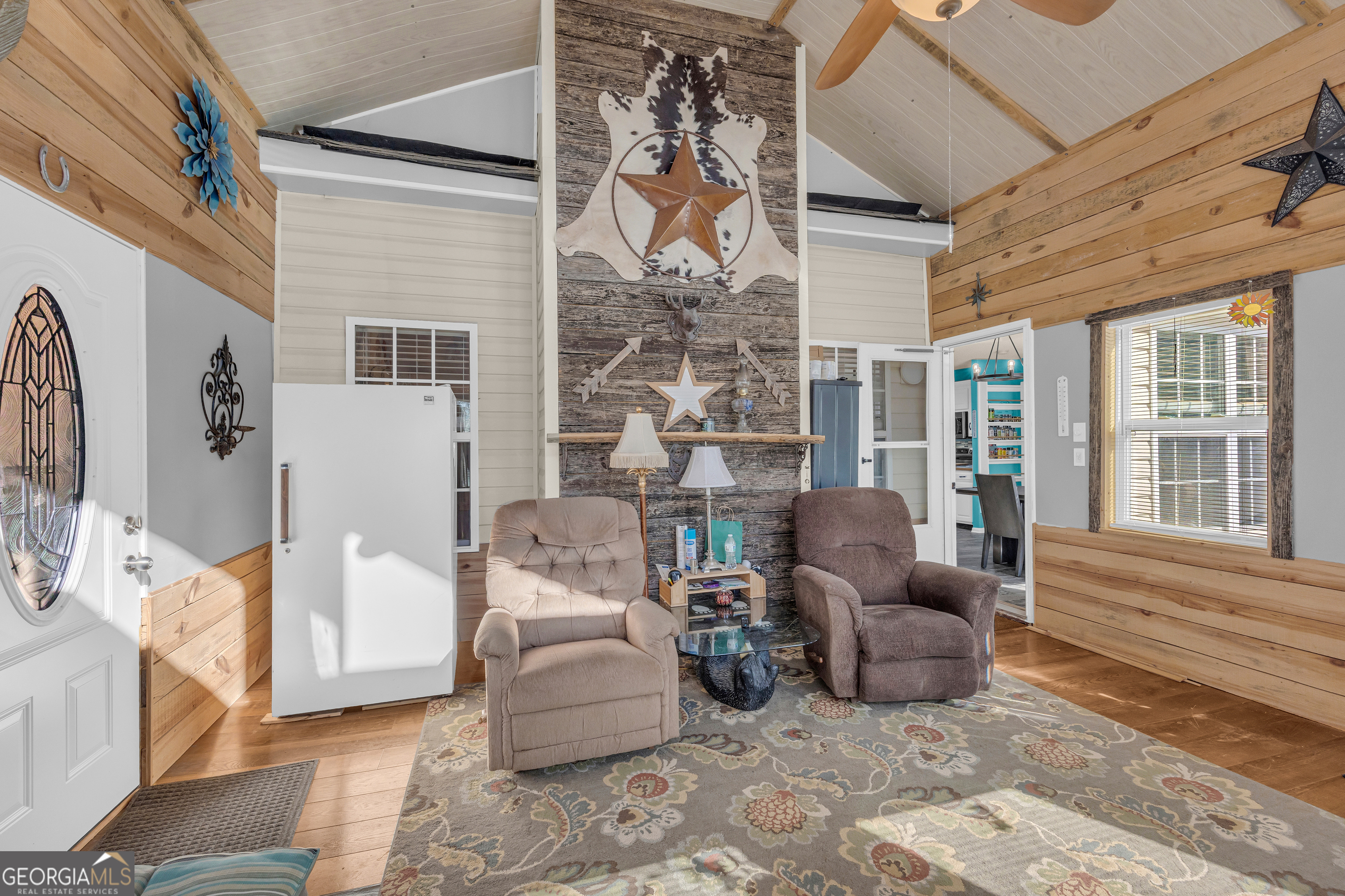 139 Silverstone Circle Jefferson, GA 30549 - Photo 42 of 85 a living room with furniture and a large window