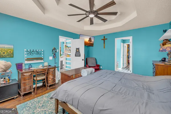 a picture of a bathroom with a shower