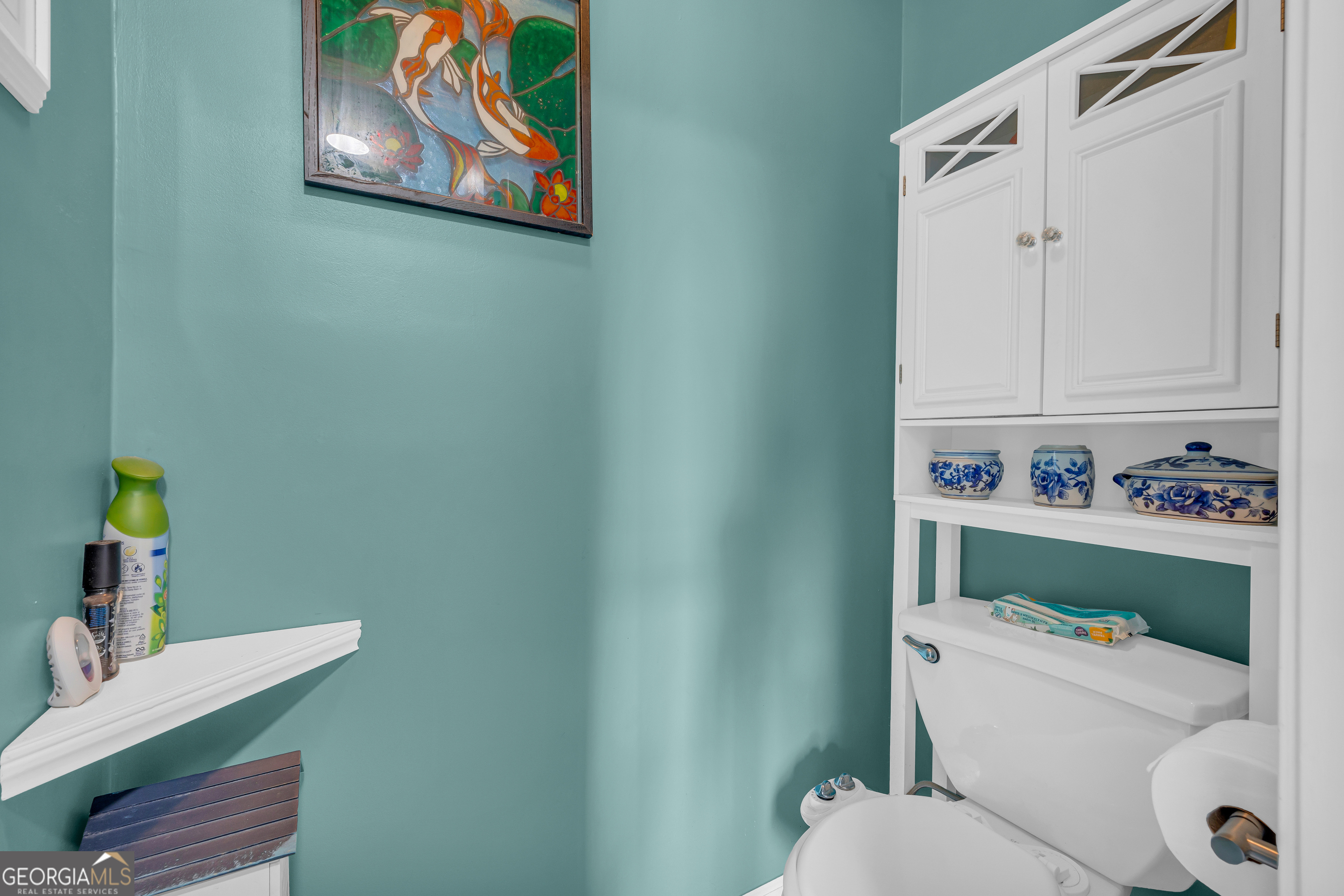 139 Silverstone Circle Jefferson, GA 30549 - Photo 54 of 85 a bathroom with a toilet and a sink