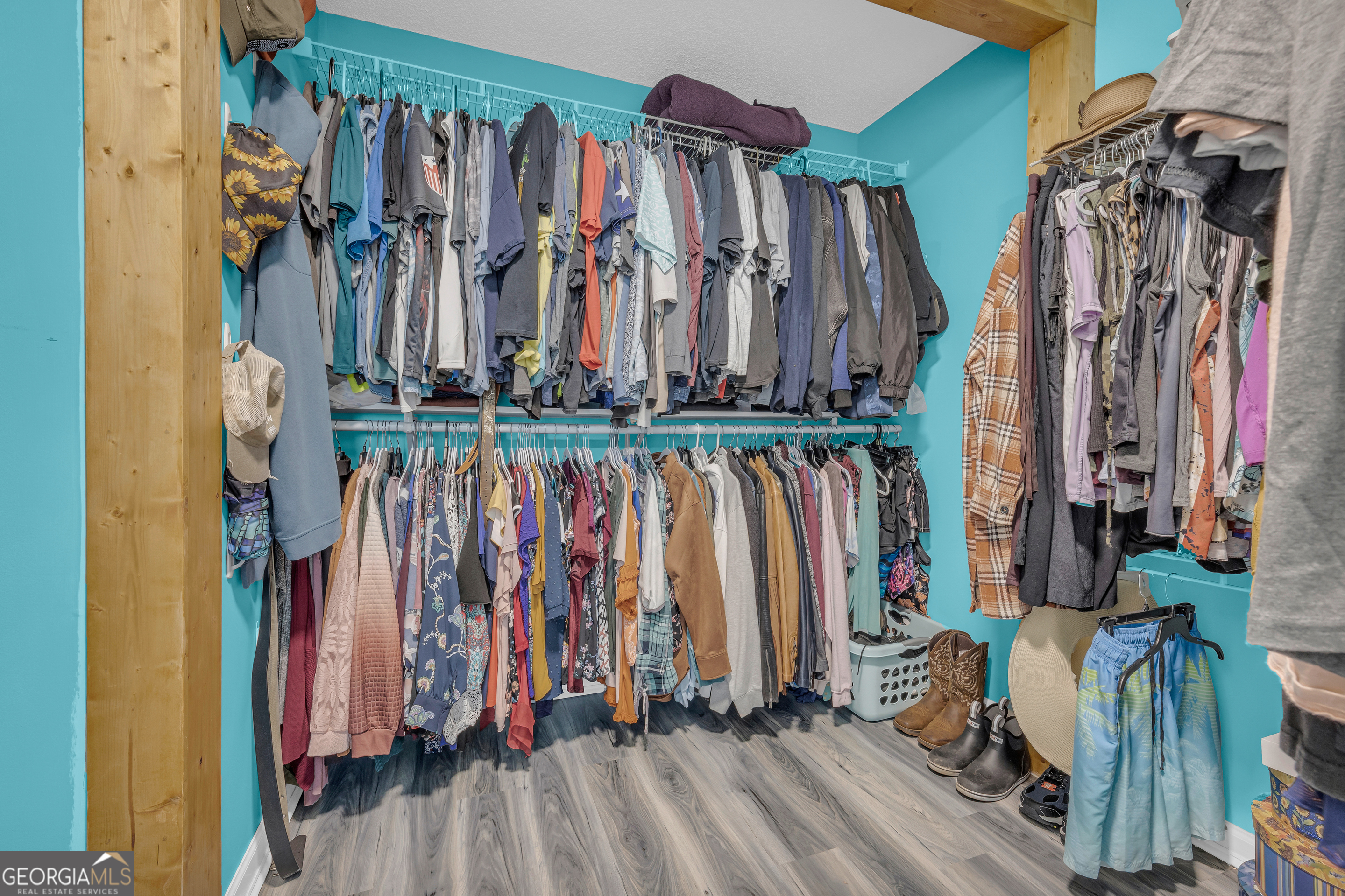 139 Silverstone Circle Jefferson, GA 30549 - Photo 57 of 85 a view of walk in closet with clothes