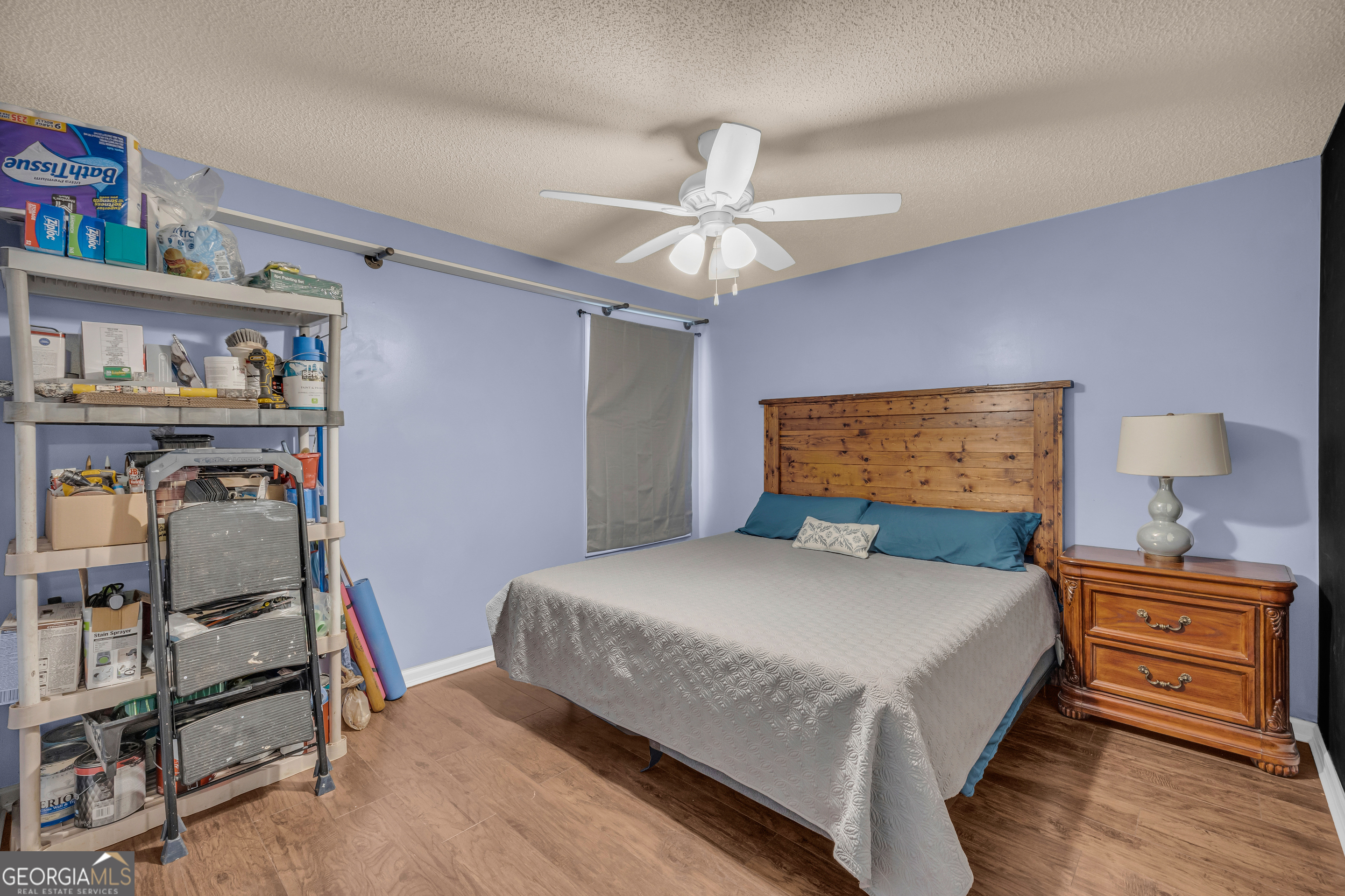 139 Silverstone Circle Jefferson, GA 30549 - Photo 60 of 85 a bedroom with a bed and a walk in closet