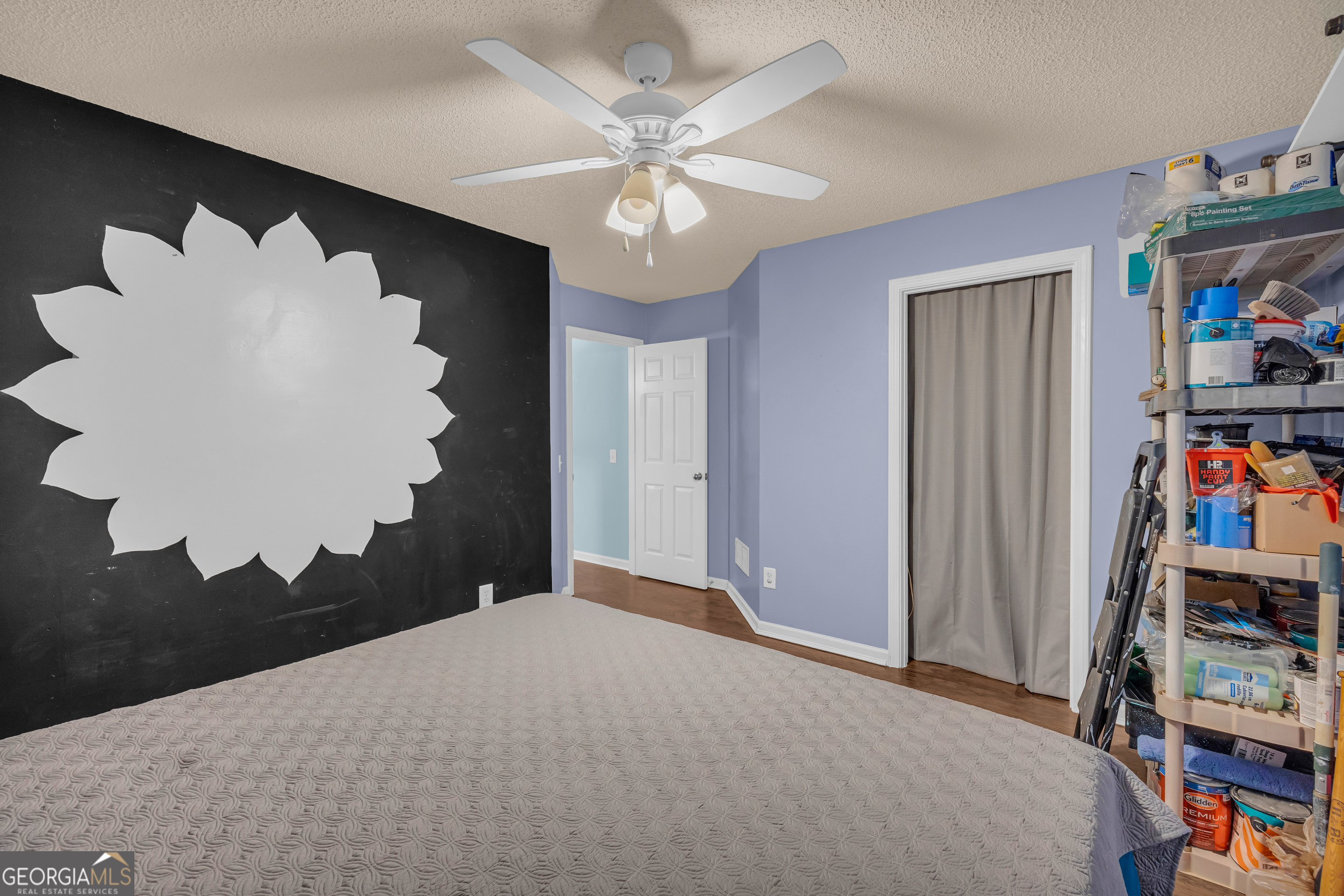 139 Silverstone Circle Jefferson, GA 30549 - Photo 61 of 85 a bedroom with a bed and a book shelf