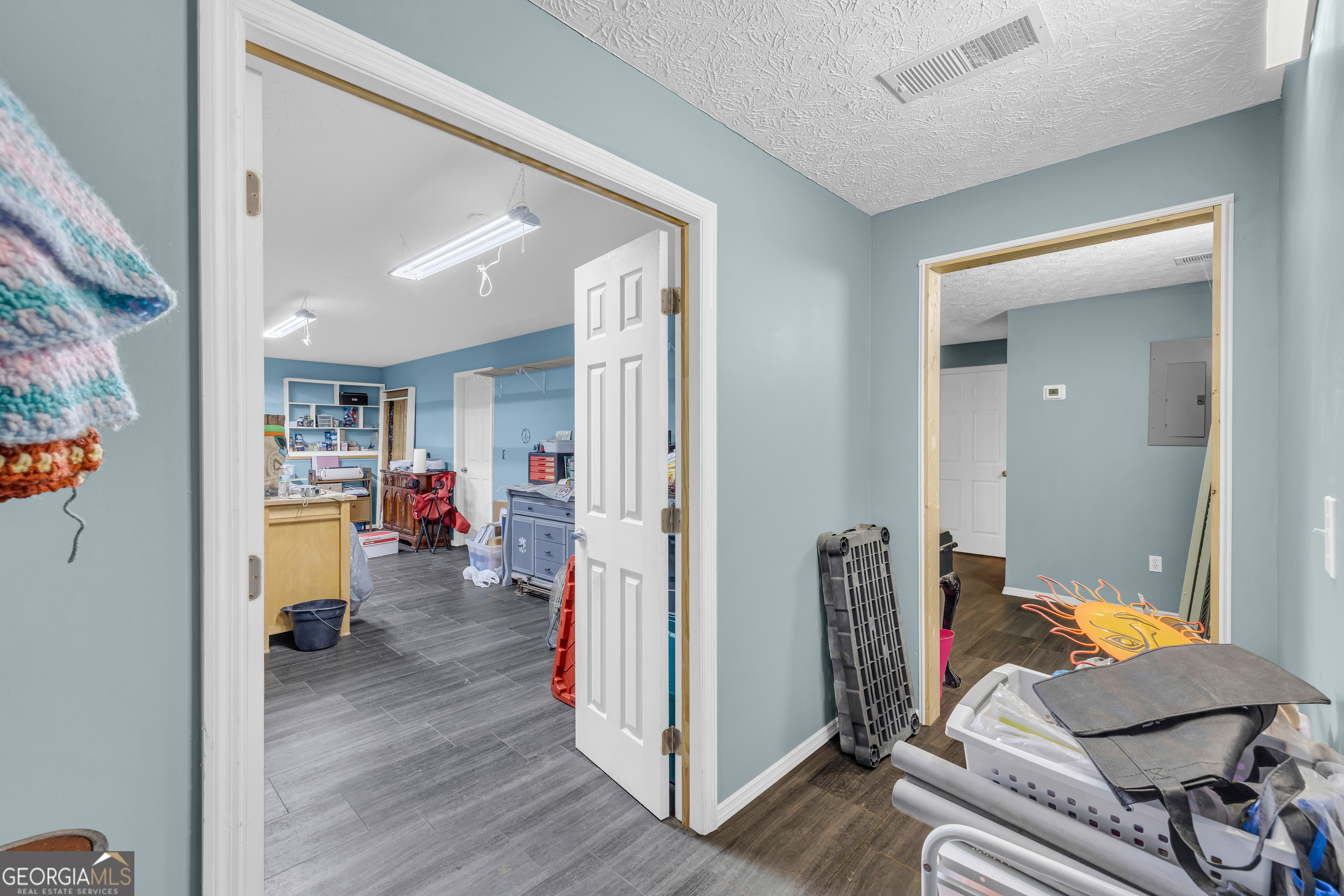 139 Silverstone Circle Jefferson, GA 30549 - Photo 66 of 85 a living room with furniture and a wooden floor