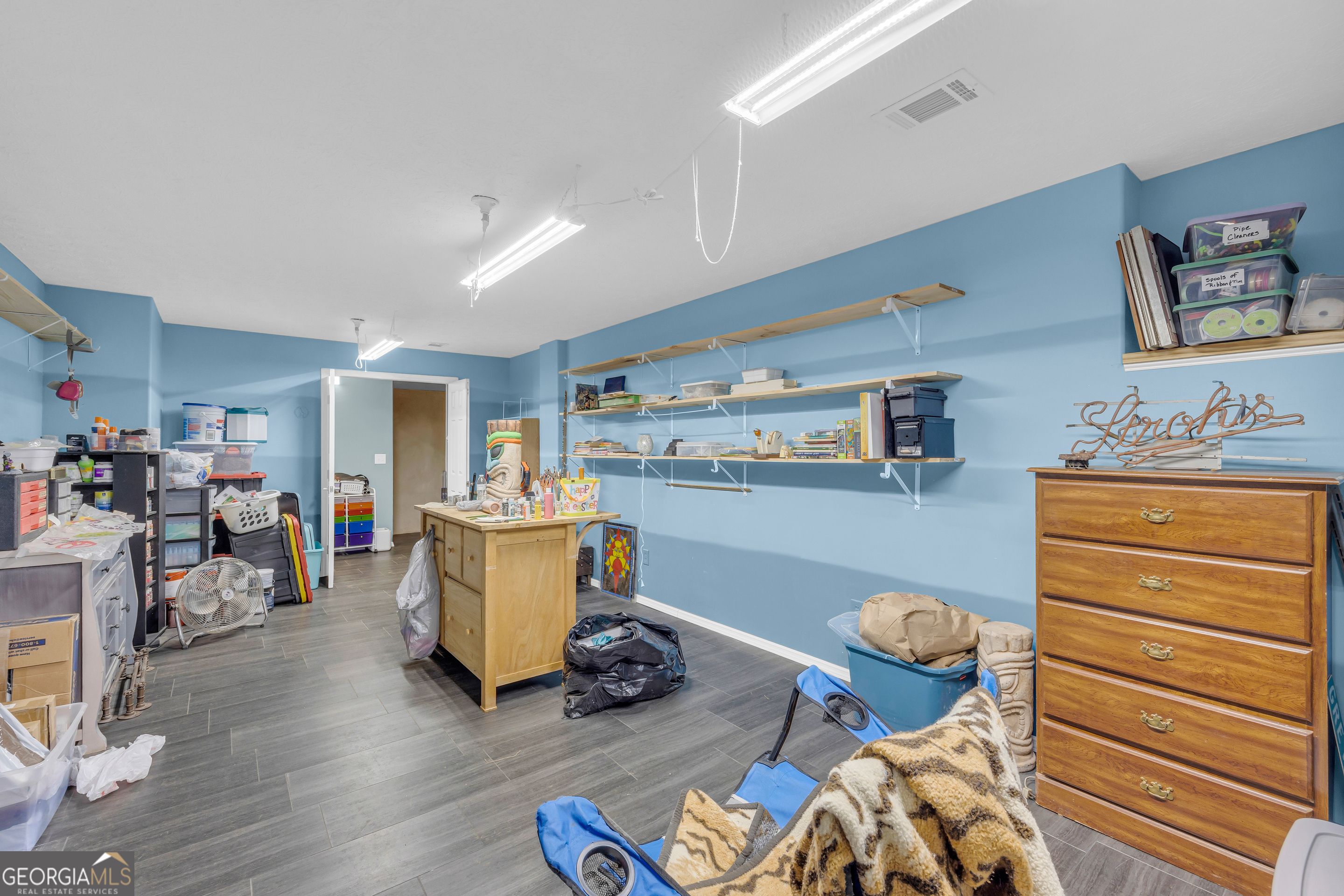 139 Silverstone Circle Jefferson, GA 30549 - Photo 69 of 85 a living room with furniture and wooden floor