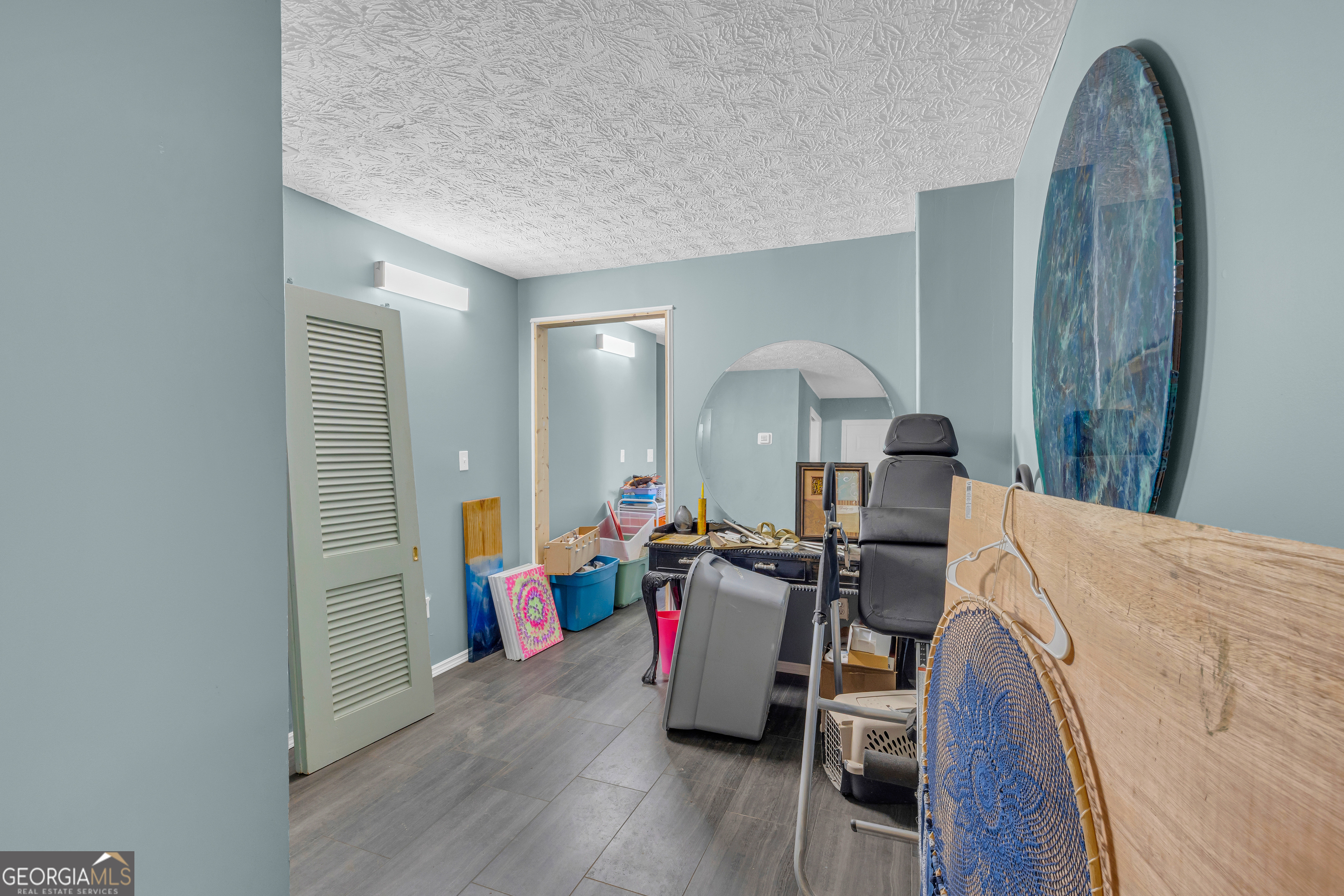 139 Silverstone Circle Jefferson, GA 30549 - Photo 71 of 85 a living room with furniture and wooden floor