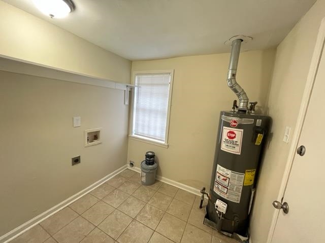 858 Eyers Road Memphis, TN 38109 - Photo 15 of 27 a view of storage and utility room with racks on the wall