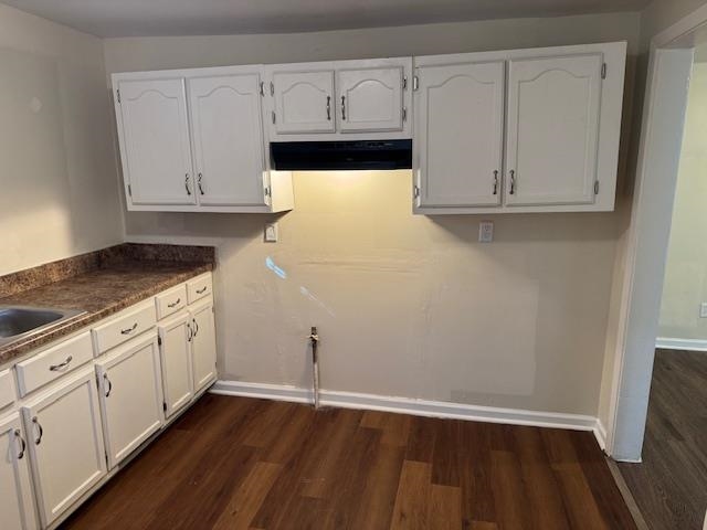 858 Eyers Road Memphis, TN 38109 - Photo 17 of 27 a kitchen with granite countertop white cabinets and sink