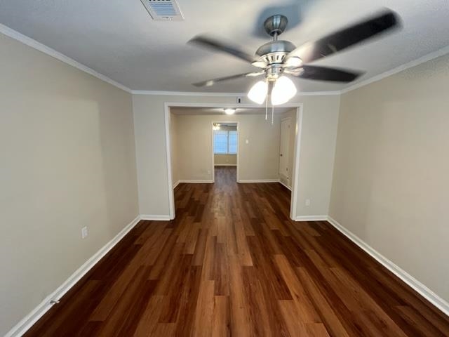 858 Eyers Road Memphis, TN 38109 - Photo 10 of 27 a view of a room with wooden floor fan and window