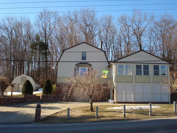 200 Chadwick Road Haverhill, MA 01835 - Photo 1 of 1 a front view of a house with garden