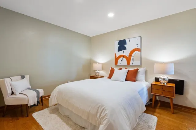 a bedroom with a bed and furniture