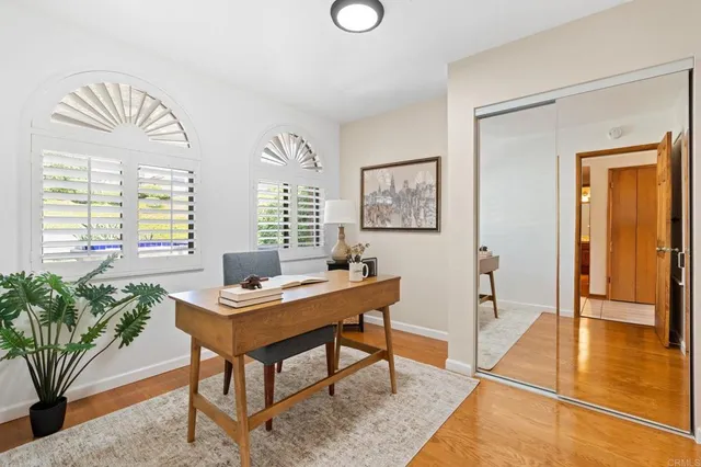 a workspace with furniture and window