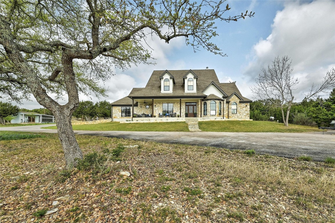 13700 Evergreen Way Austin, TX 78737 - Photo 1 of 1 a view of house with a garden