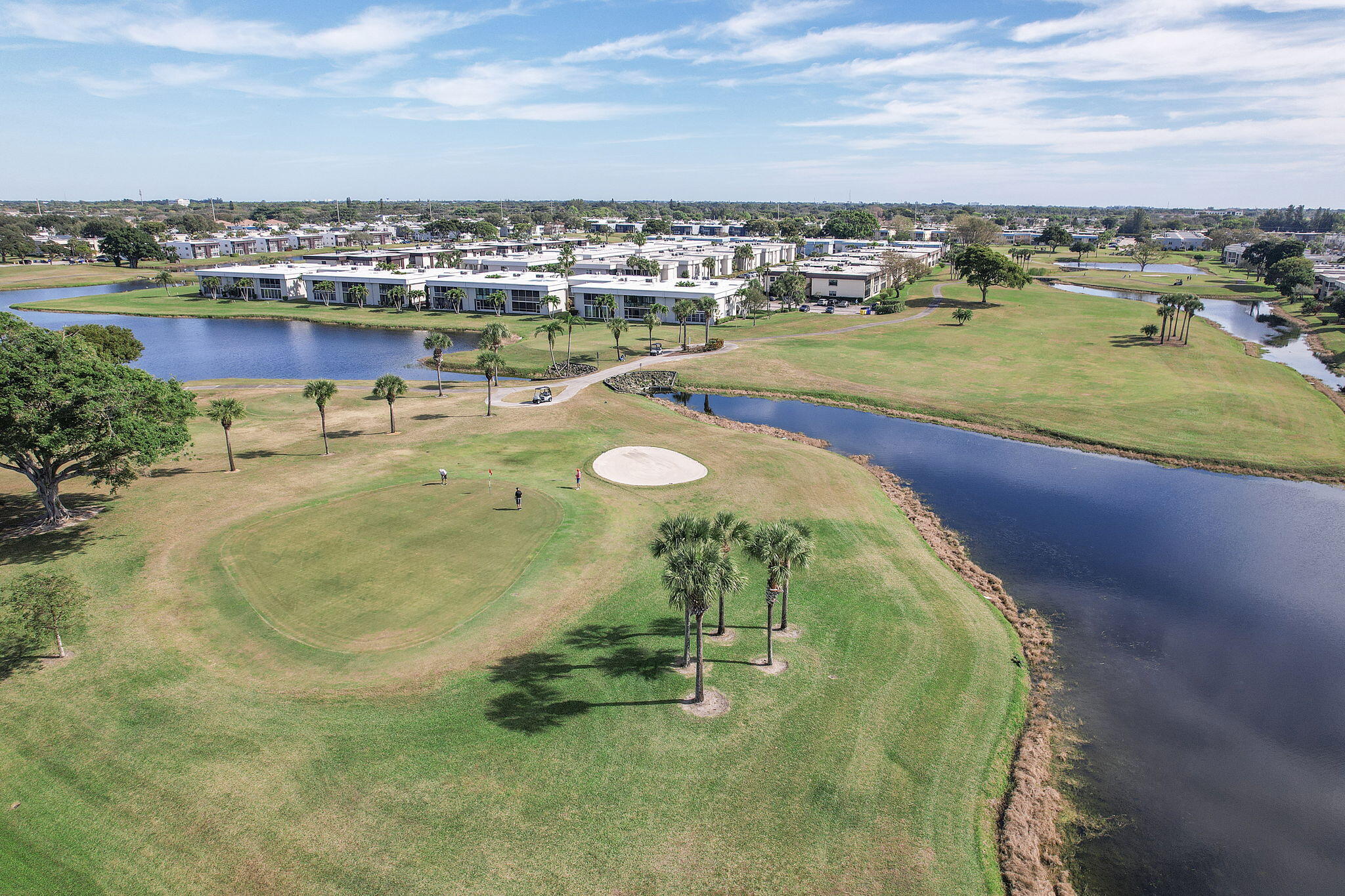 877 Flanders South Delray Beach, FL 33484 - Photo 7 of 27 a view of a lake with a yard