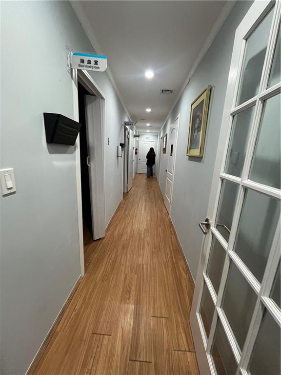 1729 East 16th Street Brooklyn, NY 11229 - Photo 4 of 10 a view of entryway with wooden floor