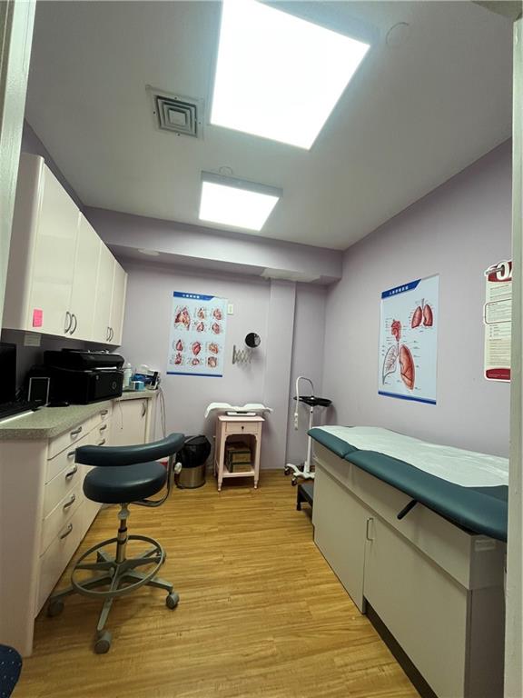 1729 East 16th Street Brooklyn, NY 11229 - Photo 6 of 10 a living room with furniture and a pool table