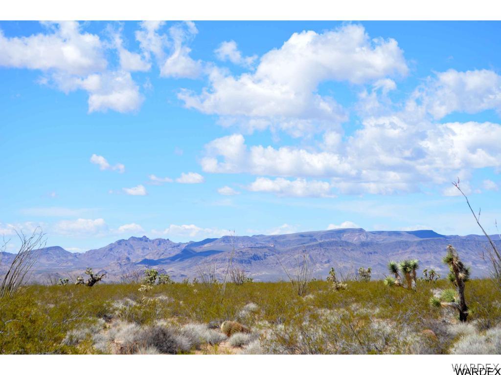 Lot 3385 Rainbow Road Yucca, AZ 86438 - Photo 4 of 13 a view of mountains and valleys in the background
