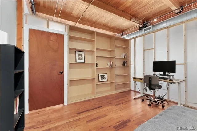 a view of a workspace with furniture