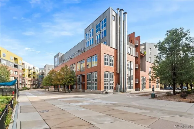 a front view of a building with street view