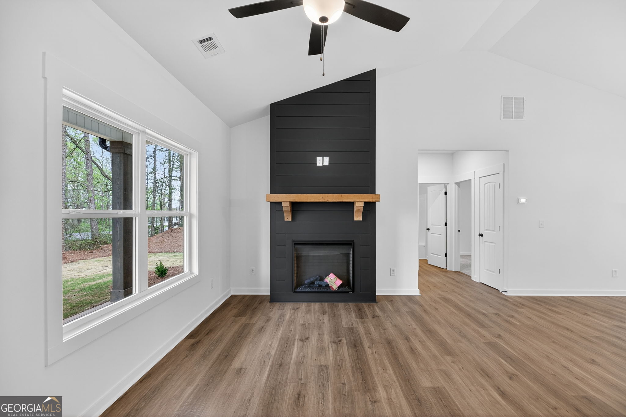 1081 Drummond Road Cedartown, GA 30125 - Photo 22 of 67 a view of empty room with wooden floor and fan