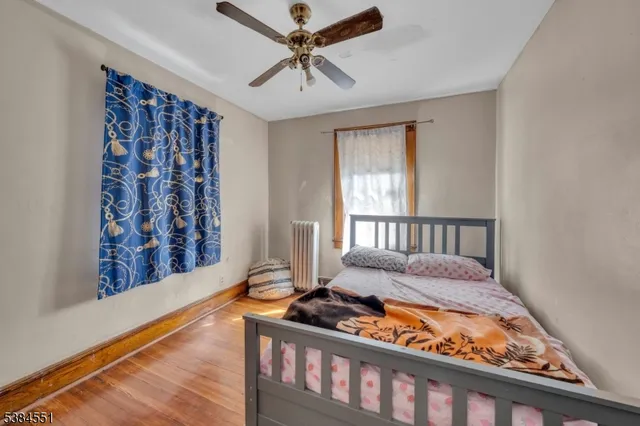 a bed room with furniture and a window