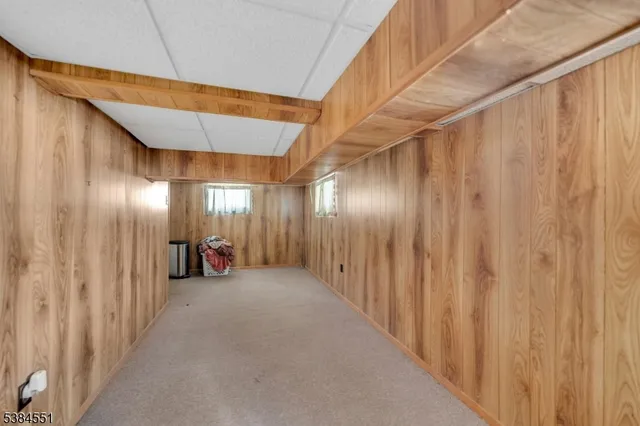 a view of a hallway with a room