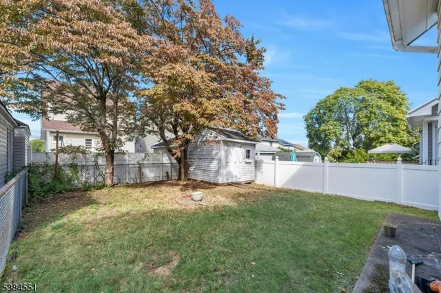 a view of a yard with a house