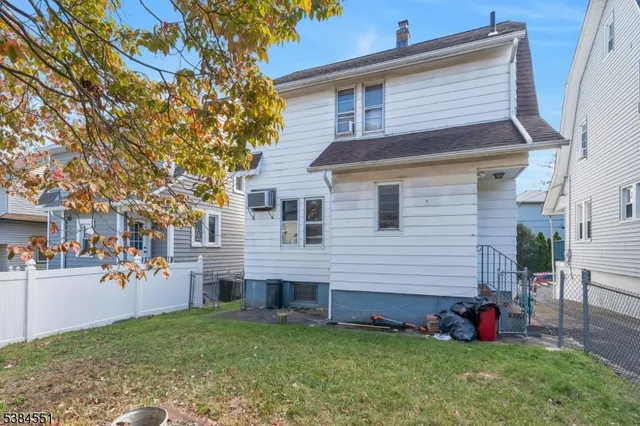 a view of a backyard with a garden